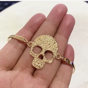 New Skull Gold Tone Unisex Bracelet.